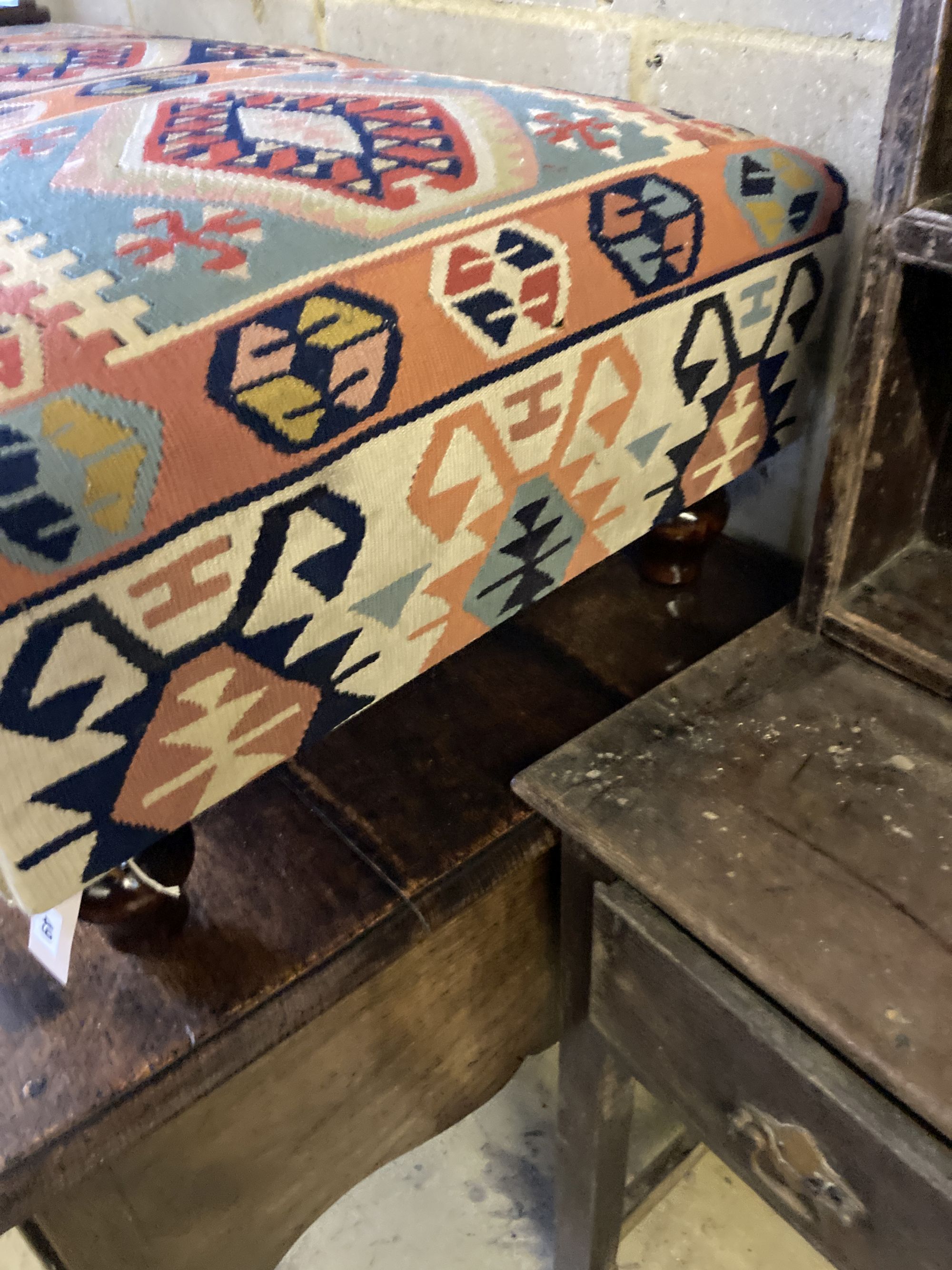 A Victorian style rectangular Kilim upholstered footstool, length 110cm, width 65cm, height 37cm